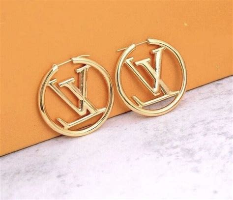 louis vuitton hat gold and gold|louis vuitton gold hoops.